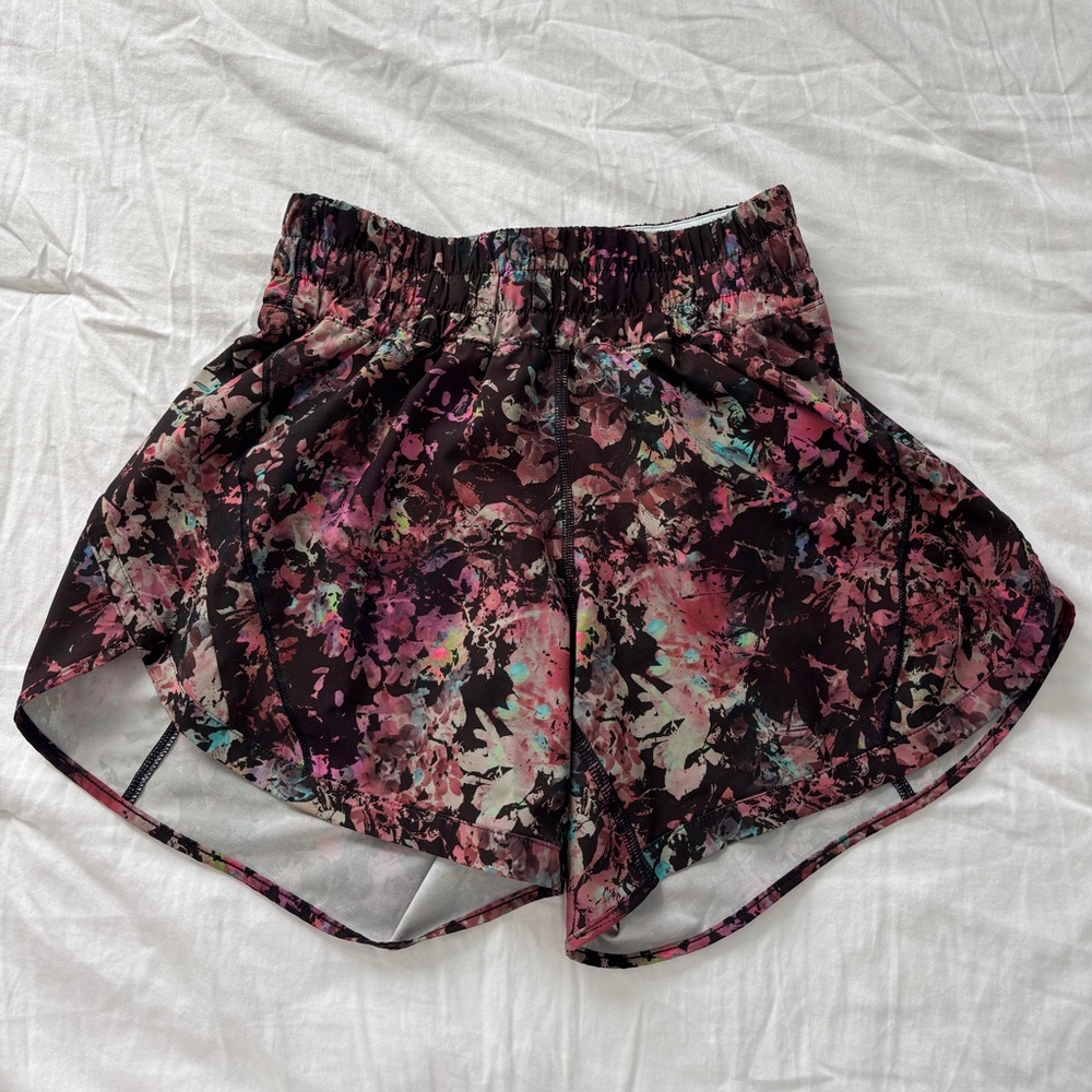 Lululemon high waisted workout shorts.  Fun bold black pink pattern size 4